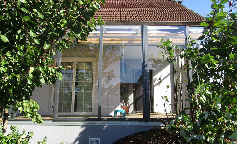 Abri terrasse rétractable au vitrage 100 % transparent