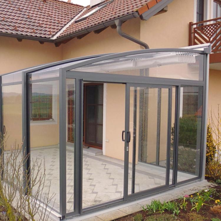 Abri de terrasse Topaz dans un angle avec portique de prolongement pour extaension de l'abri coulissant